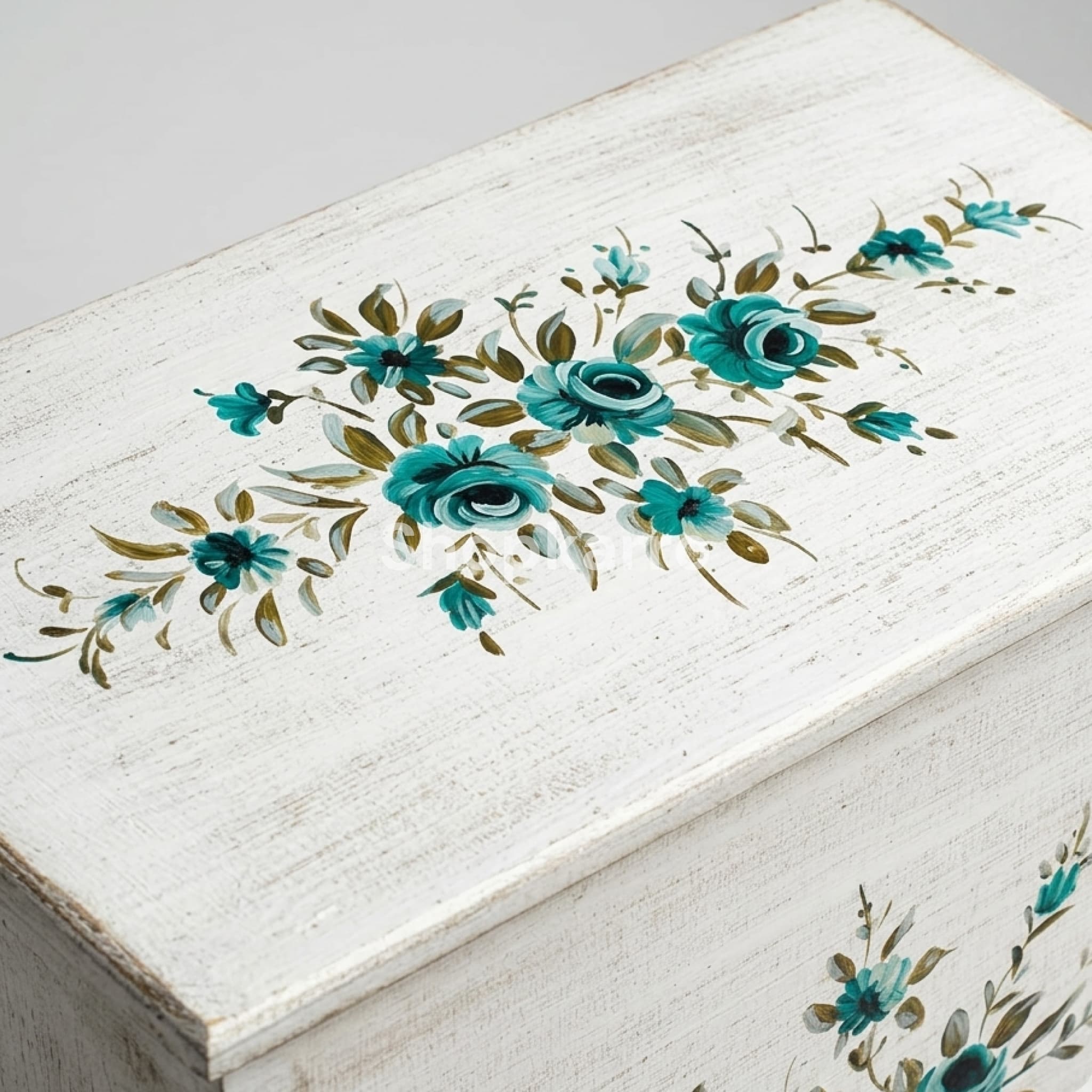 Antique white turquoise floral Quran box styled beside bed in boho bedroom