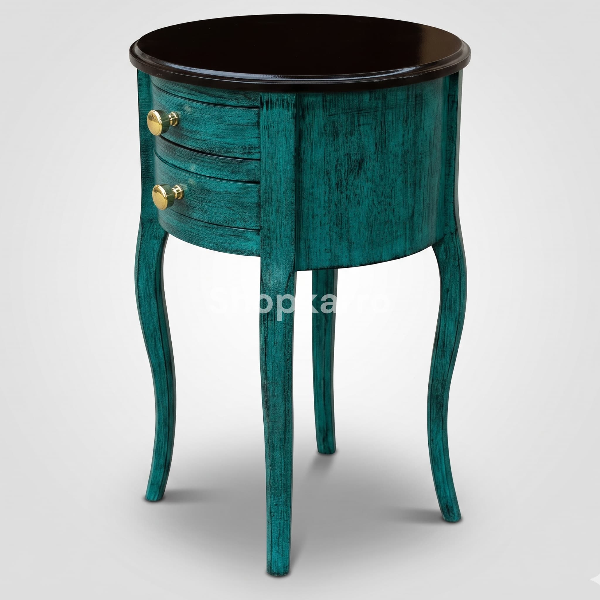 Angled view of Bliss Teal Wooden Table showing cylindrical body depth, black top profile and curved teal legs