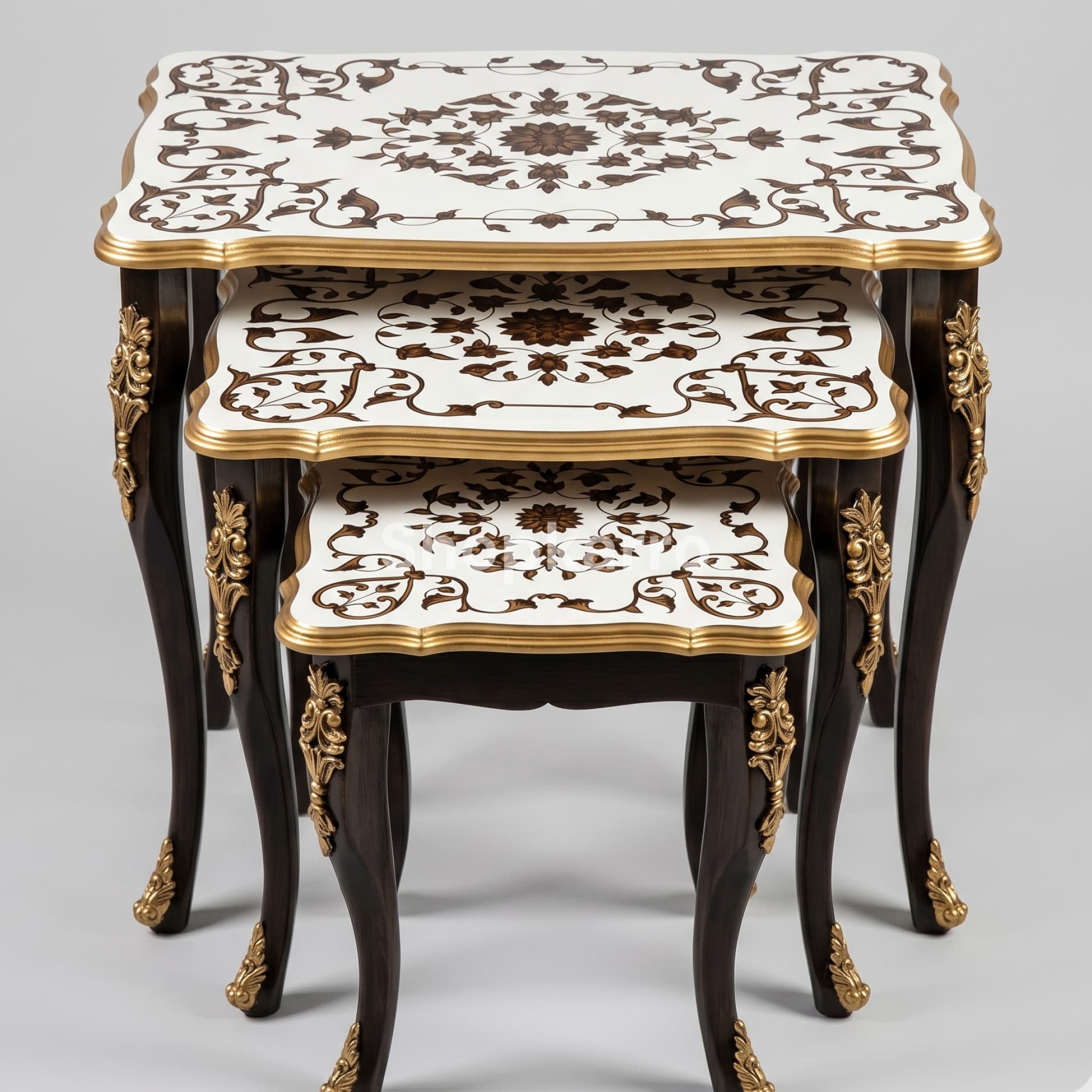 Front view of Divine Bloom Nesting Tables set of 3 nested showing mandala arabesque patterns and gold claw feet