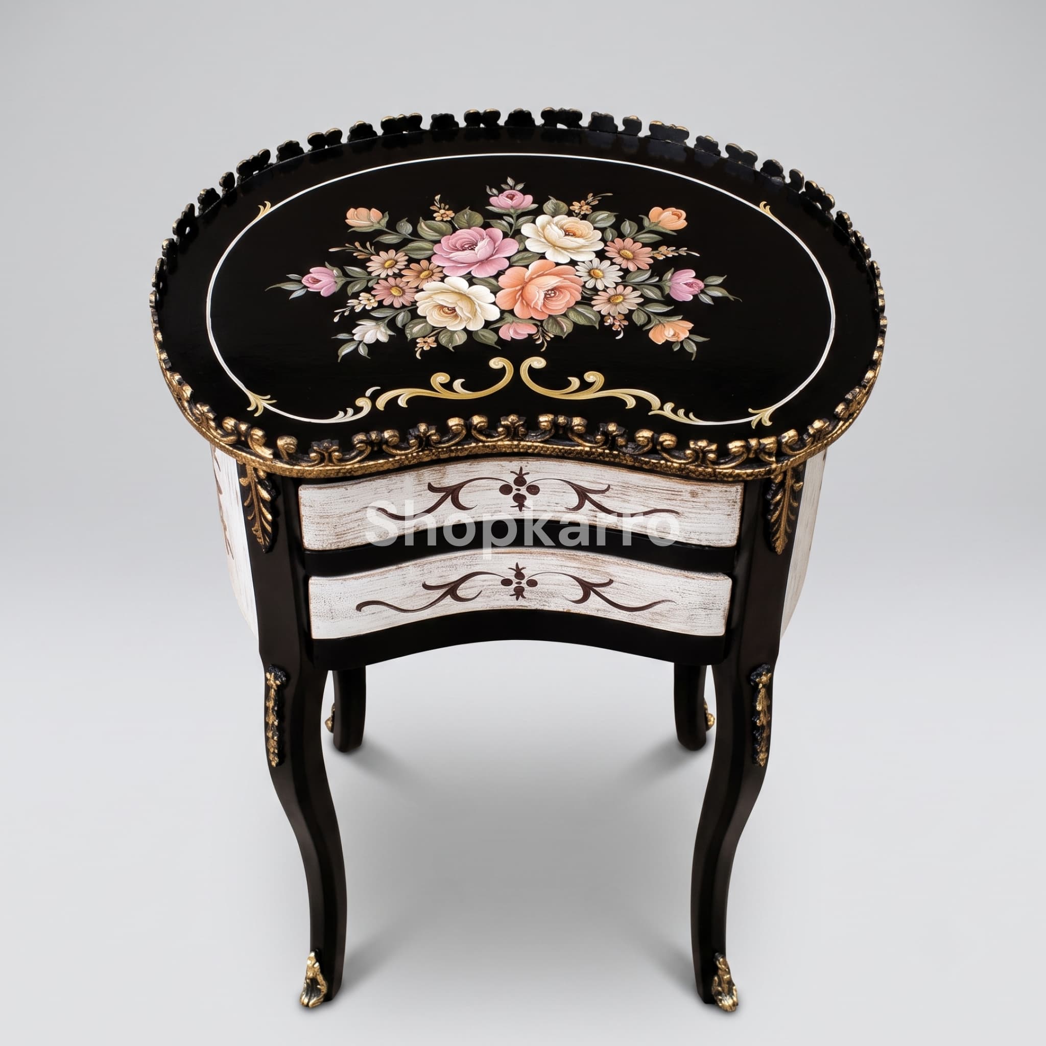 Front view of Daisy Blossom Wooden Table showing black top with floral oval, white drawers and gold claw feet
