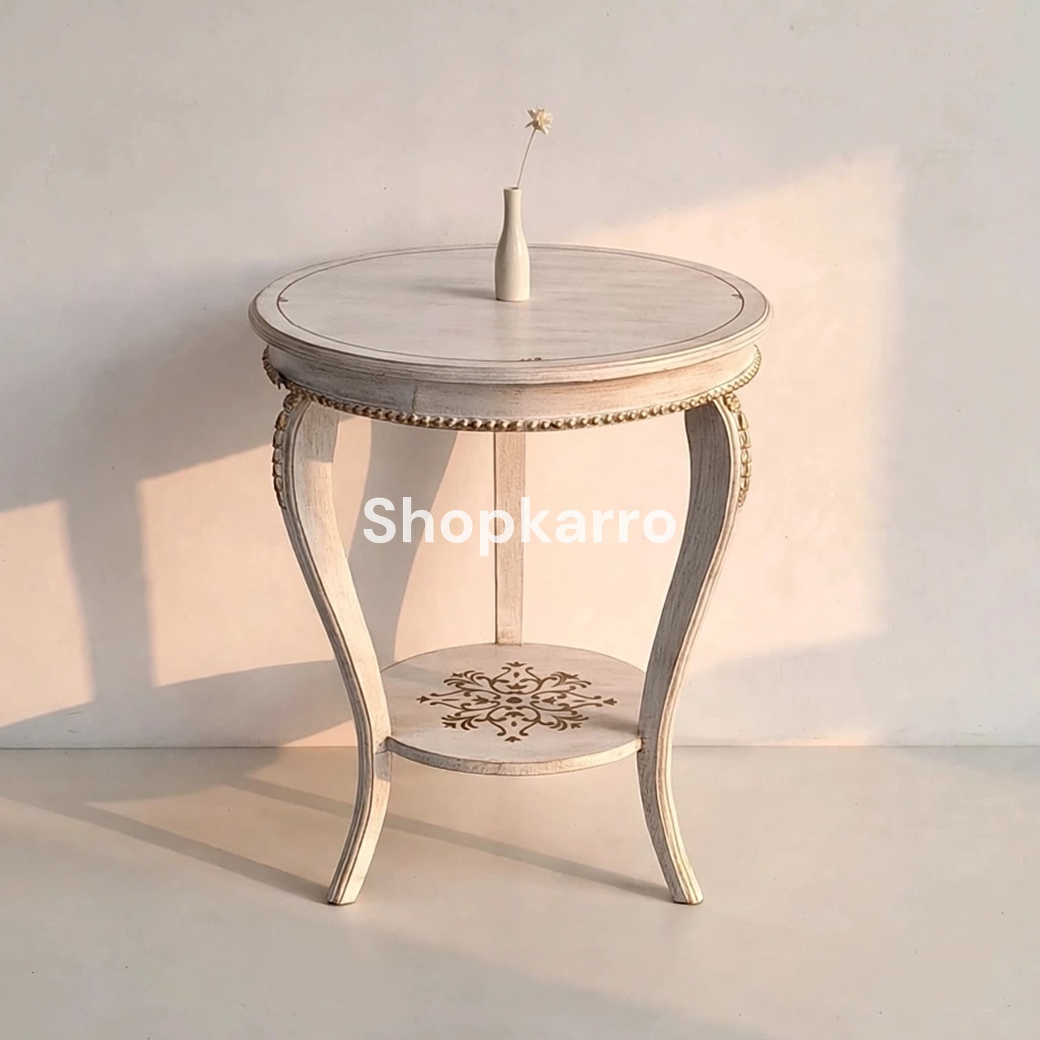 Front view of Grand Alabaster French End Table showing white finish, gold bead trim and arabesque lower shelf