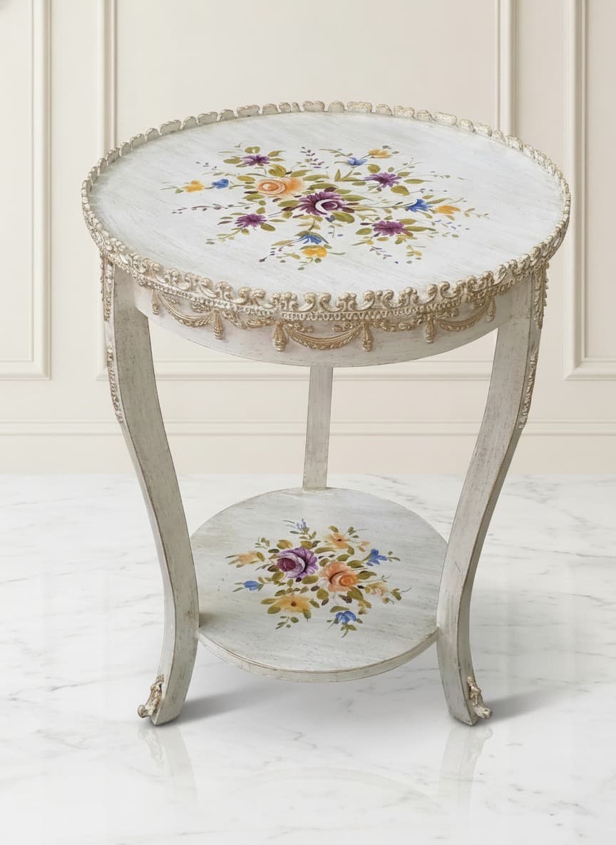 Close-up view of Floral Heritage Coffee Table's gold-toned scalloped rim and swag trim