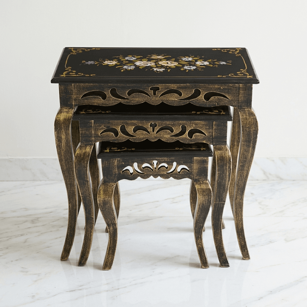 Royal Ebony Nesting Tables stacked together showing gold carved apron