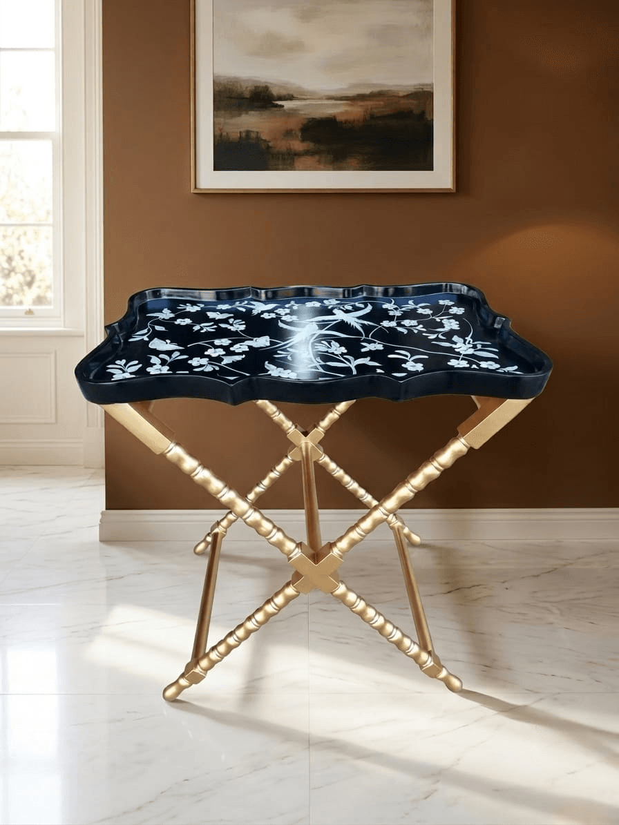 Scalloped-edge black lacquer tray table with gold turned X-frame legs
