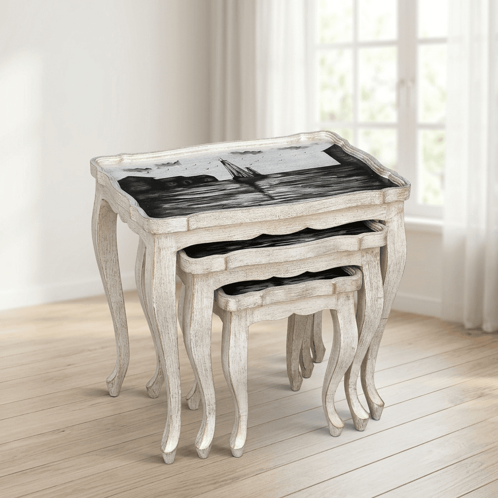 Vintage-style 3-piece nesting tables with distressed whitewash finish and nautical harbor painting 