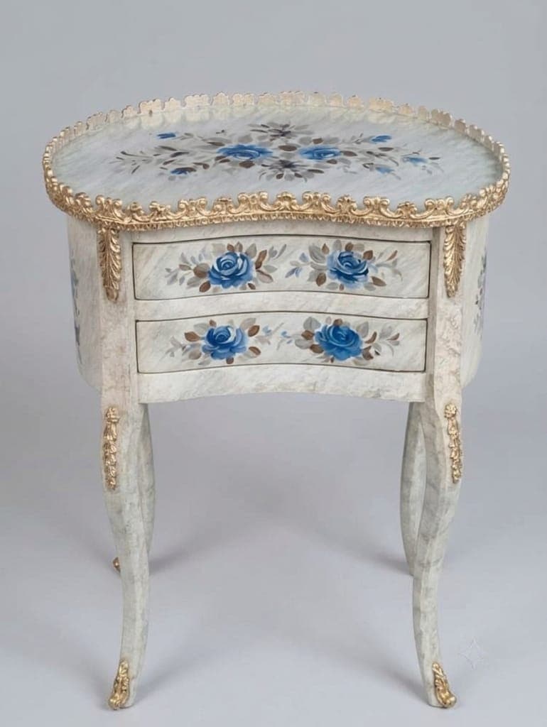 Elegant wooden side table with two drawers and curved legs in cream finish"