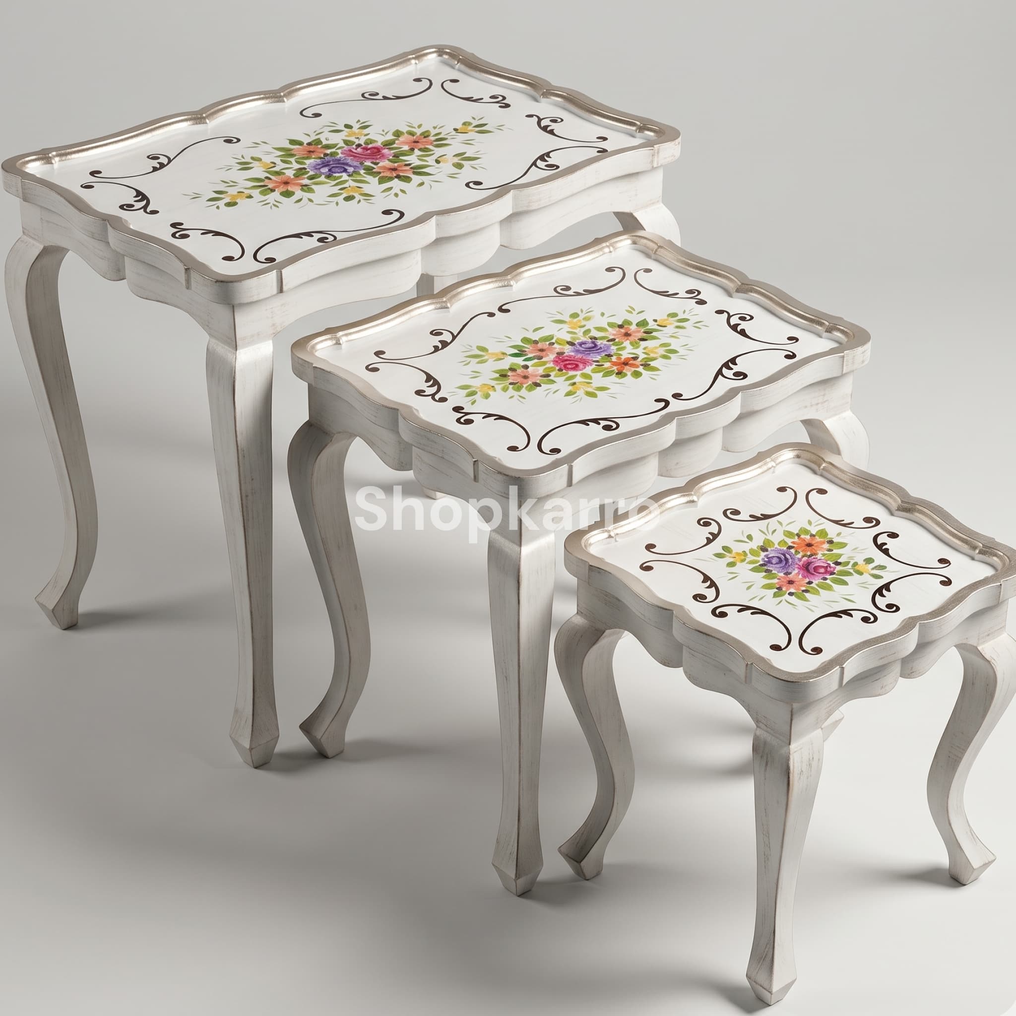 All three Artisan Flora Nesting Tables in horizontal row showing graduating sizes and full front view